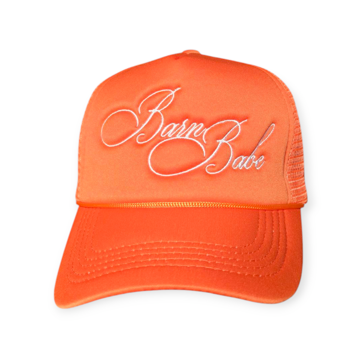 Front-facing bright orange trucker hat with a curved brim and mesh back, featuring “Barn Babe” embroidered in white across the front.