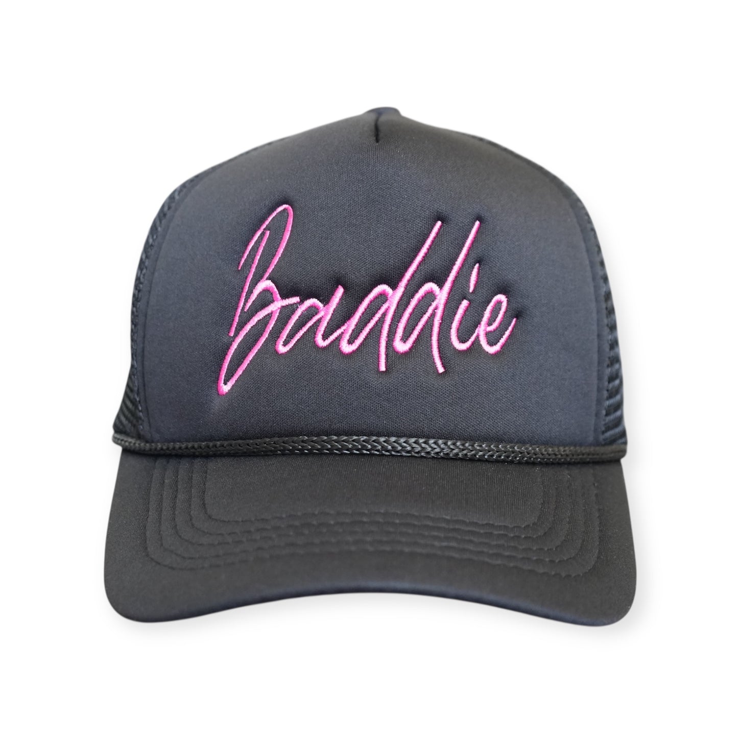 This is a Baddie V1 trucker hat in black with a pink embroidered design on the front panel, facing forward.