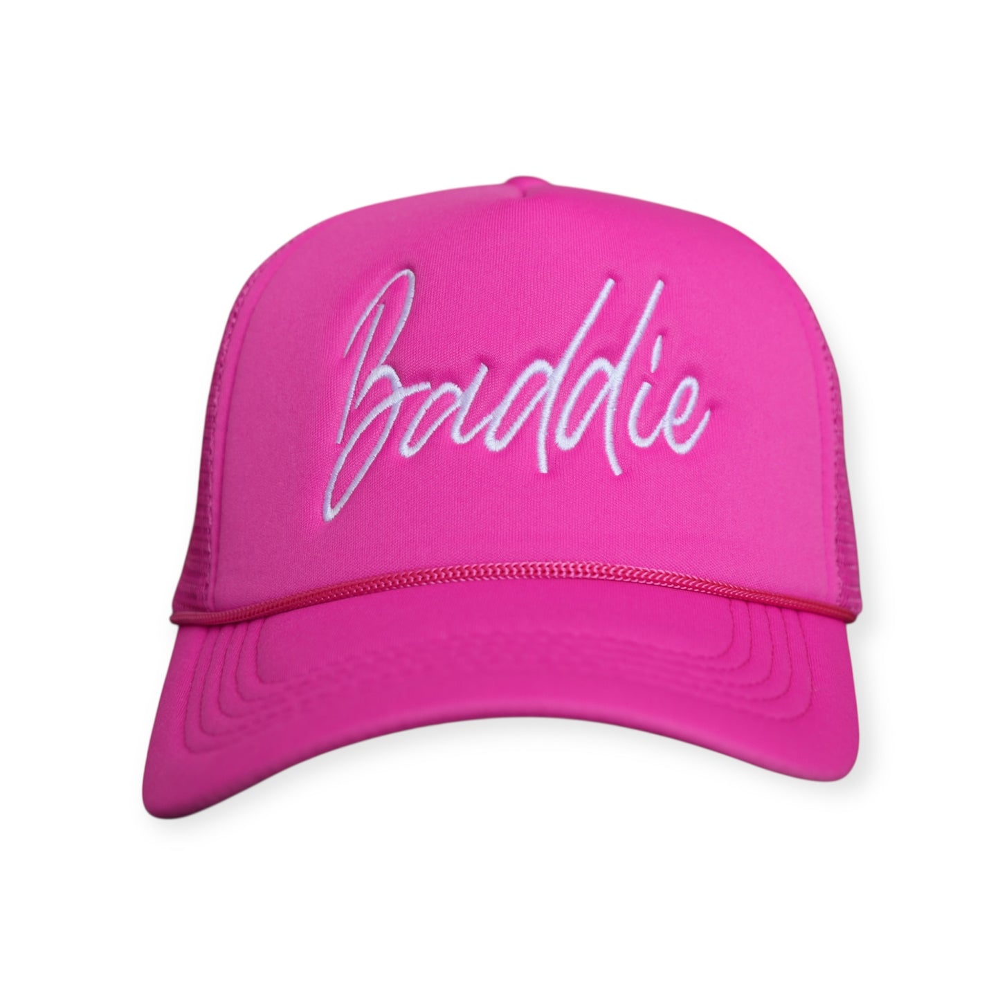 This is a Baddie V1 trucker hat in pink with a white embroidered design on the front panel, facing forward.