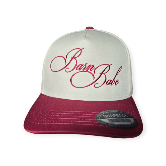 This is a Barn Babe V1 structured hat in burgundy beige with a burgundy embroidered design on the front panel, facing forward.