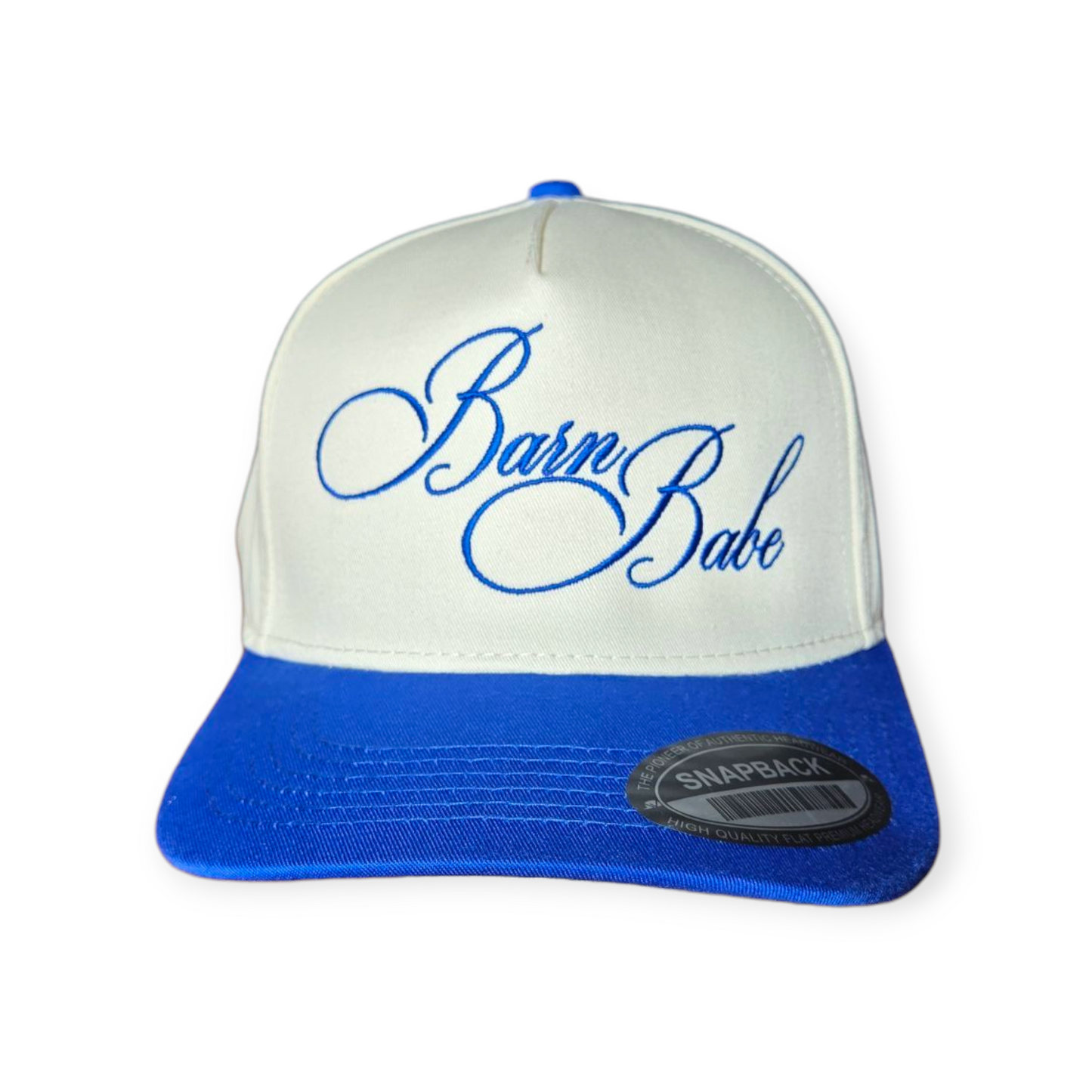 This is a Barn Babe V1 structured hat in royal blue beige with a royal blue embroidered design on the front panel, facing forward.