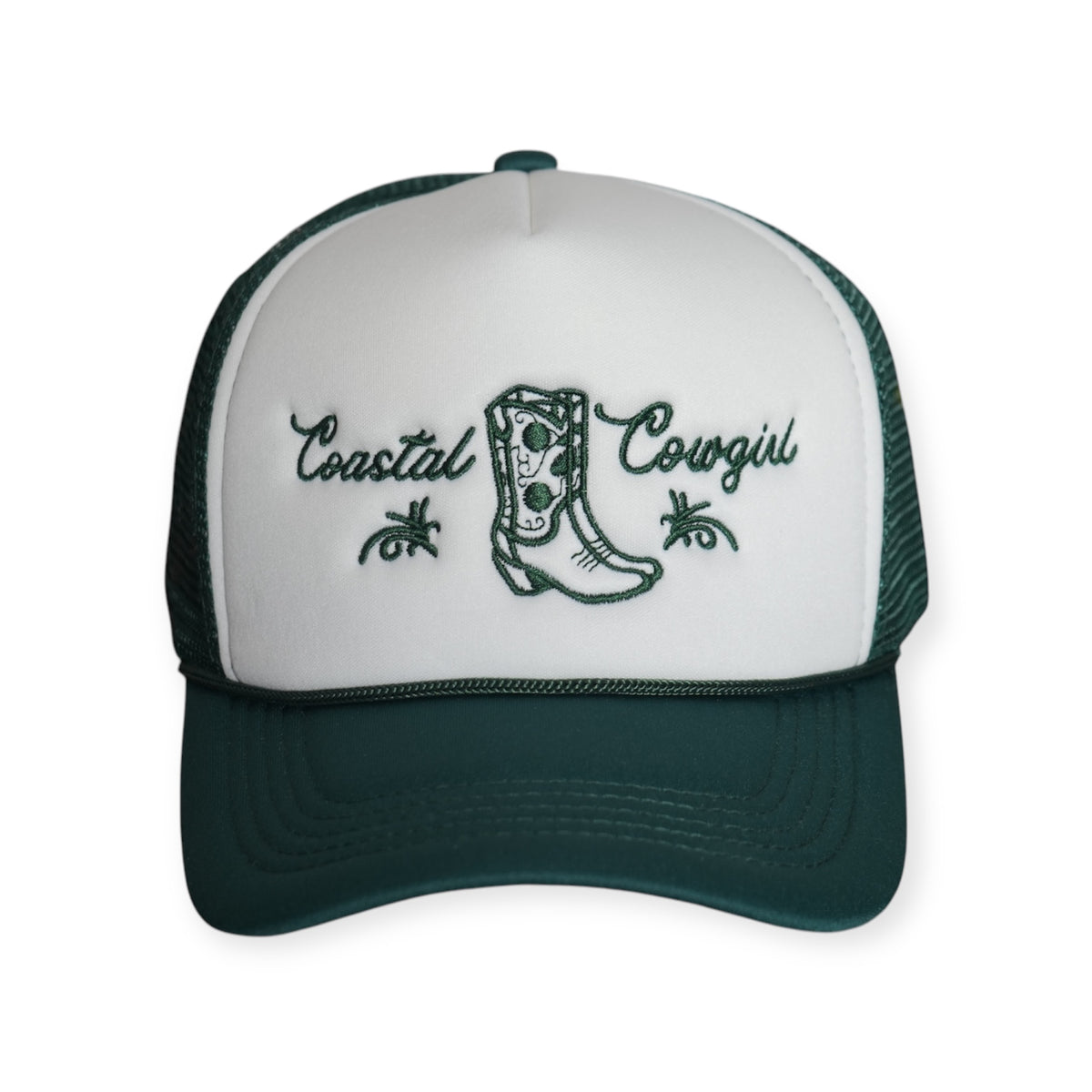 Front-facing Coastal Cowgirl V1 trucker snapback hat with a white front and dark green bill, featuring “Coastal Cowgirl” and a western boot embroidered in dark green.